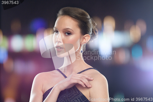 Image of beautiful young asian woman with earring