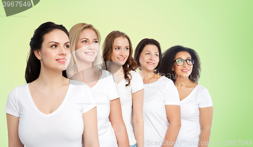 Image of group of happy different women in white t-shirts