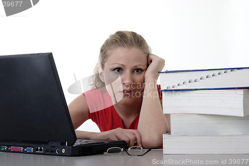 Image of Overwhelmed girl doing homework