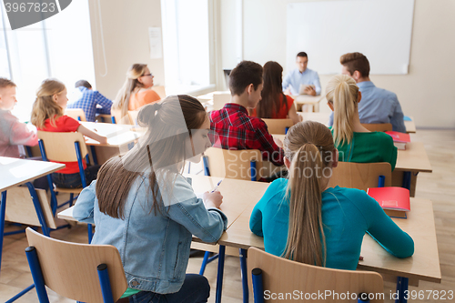 Image of group of students writing school test