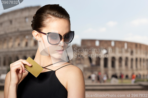 Image of beautiful young woman in elegant black sunglasses