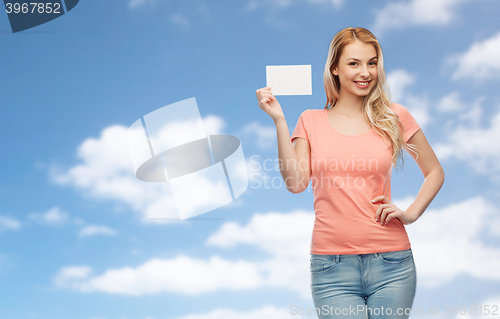 Image of happy woman or teen girl with blank white paper