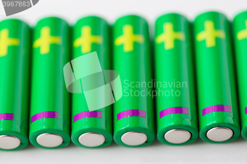 Image of close up of green alkaline batteries