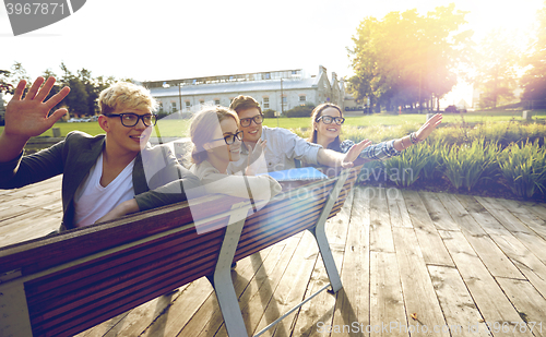 Image of group of students or teenagers hanging out