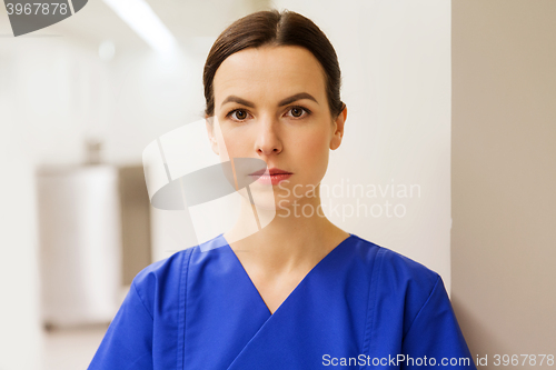 Image of doctor or nurse at hospital corridor