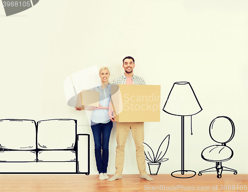 Image of couple with cardboard boxes moving to new home