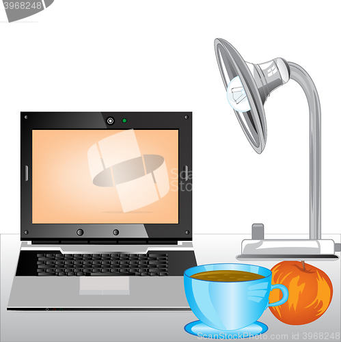 Image of Computer and cup coffee on table