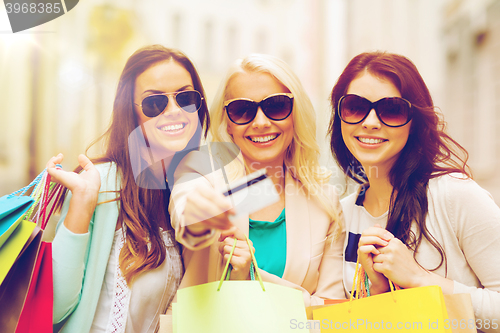 Image of girls with shopping bags in ctiy