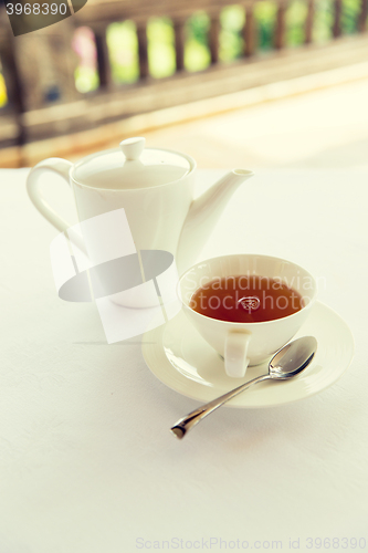 Image of tea-set on table at restaurant or teahouse