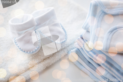 Image of close up of baby boys clothes for newborn on table