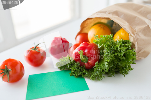 Image of basket of fresh ripe vegetables at kitchen