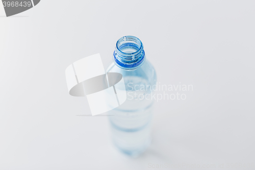 Image of close up of bottle with drinking water on table