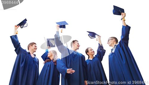 Image of group of smiling students with mortarboards