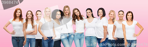 Image of group of happy different women in white t-shirts