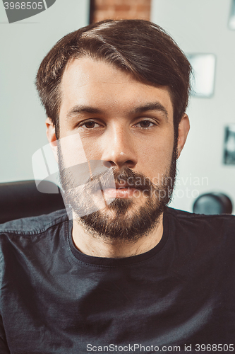 Image of The young man looking at camera