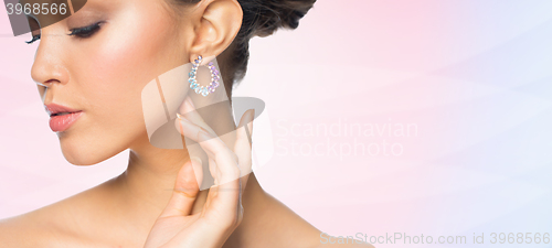 Image of close up of beautiful woman face with earring