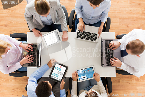 Image of business team with laptop and tablet pc computers