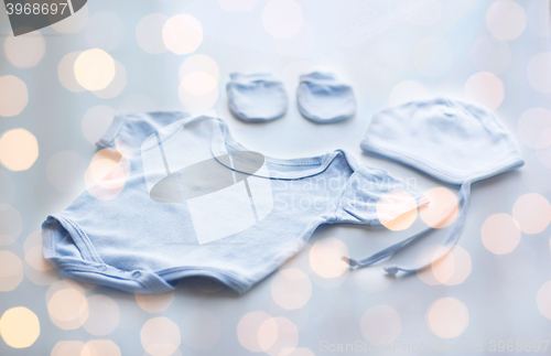 Image of close up of baby boys clothes for newborn on table