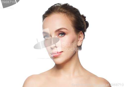 Image of beautiful young woman face over white background