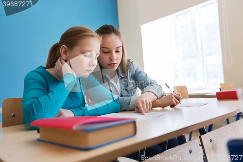 Image of group of students with school test