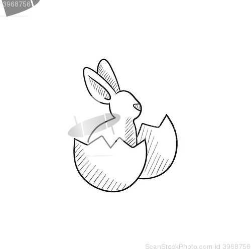 Image of Easter bunny sitting in egg shell sketch icon.
