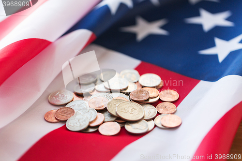 Image of close up of american flag and money