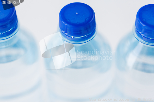 Image of close up of plastic bottles with drinking water