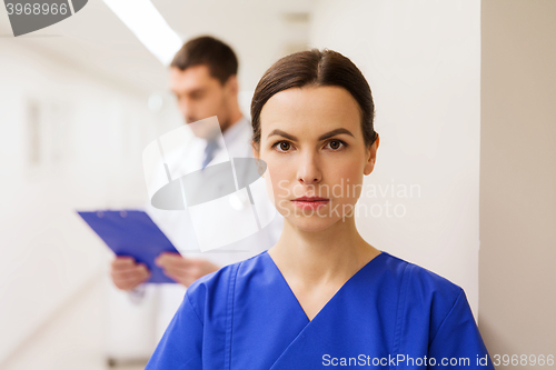 Image of doctor or nurse at hospital corridor