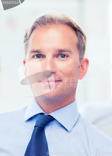 Image of businessman in office