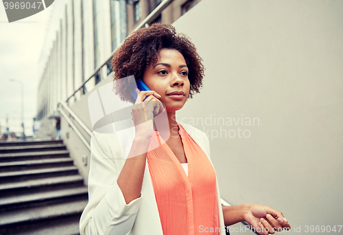 Image of african businesswoman calling on smartphone