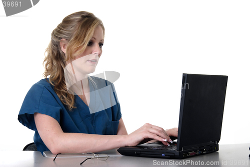 Image of Medical assistant working on laptop