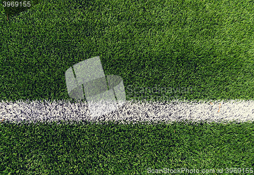 Image of close up of football field with line and grass