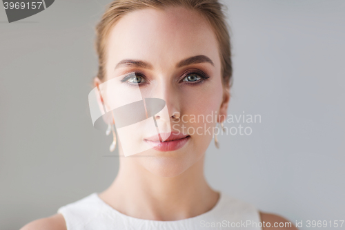 Image of face of beautiful woman or bride in white dress