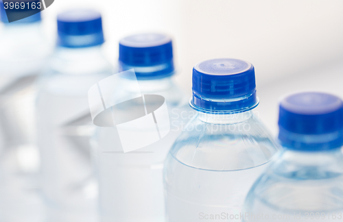 Image of close up of plastic bottles with drinking water