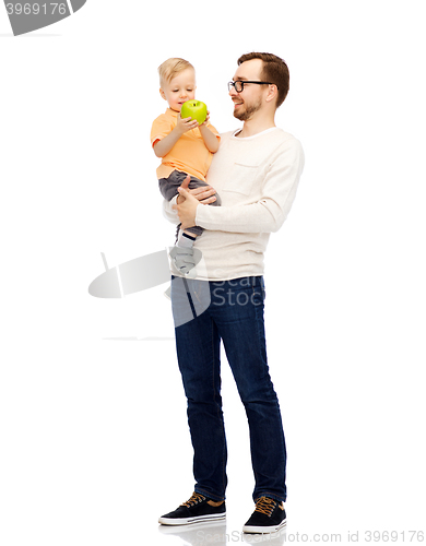 Image of happy father and little son with green apple