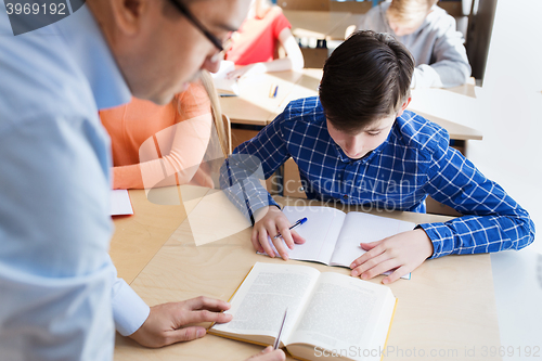 Image of group of students and teacher at school classroom