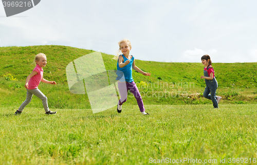 Image of group of happy kids running outdoors
