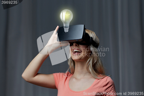 Image of woman in virtual reality headset or 3d glasses