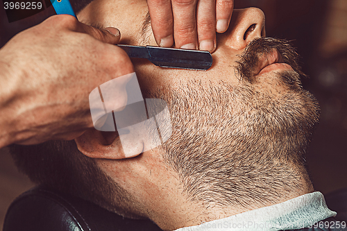 Image of Hipster client visiting barber shop