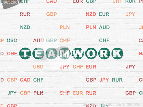 Image of Finance concept: Teamwork on wall background