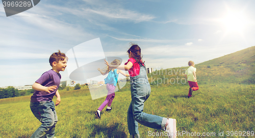 Image of group of happy kids running outdoors