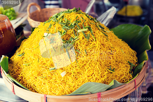 Image of cooked noodles at street market