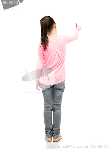 Image of little girl drawing or writing with marker