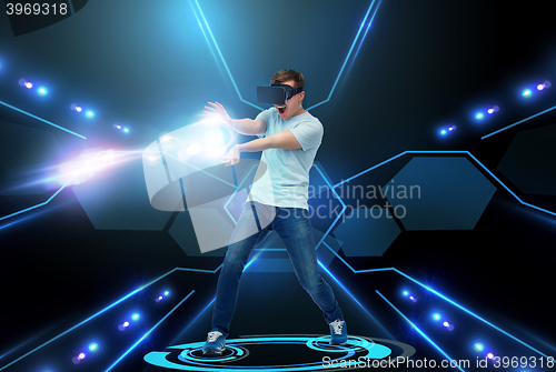 Image of happy man in virtual reality headset or 3d glasses