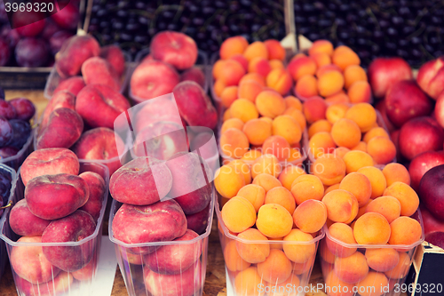 Image of close up of peaches and apricots at street market