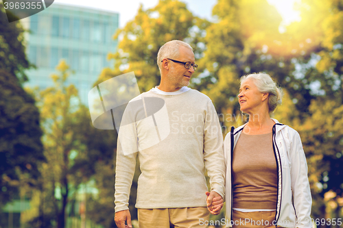 Image of senior couple in city park