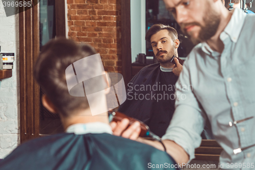 Image of Hipster client visiting barber shop