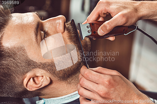 Image of Hipster client visiting barber shop