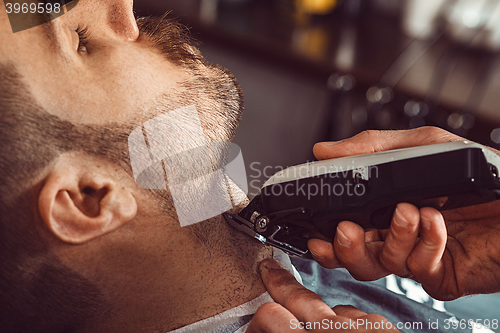 Image of Hipster client visiting barber shop