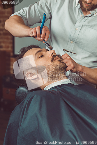 Image of Hipster client visiting barber shop